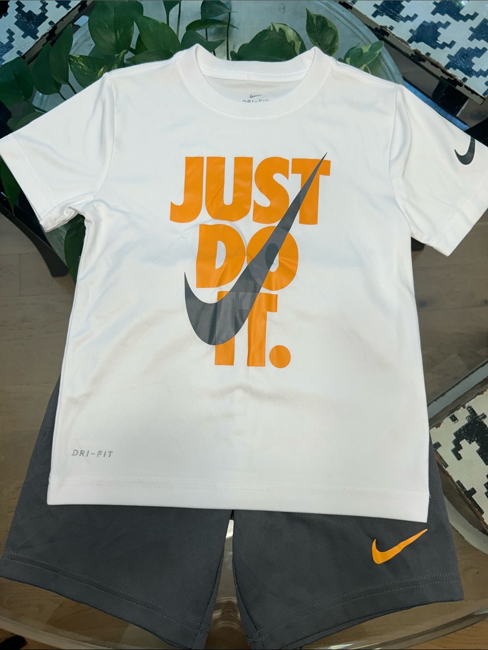 Nike White Tee with Orange "JUST DO IT." and Gray Swoosh